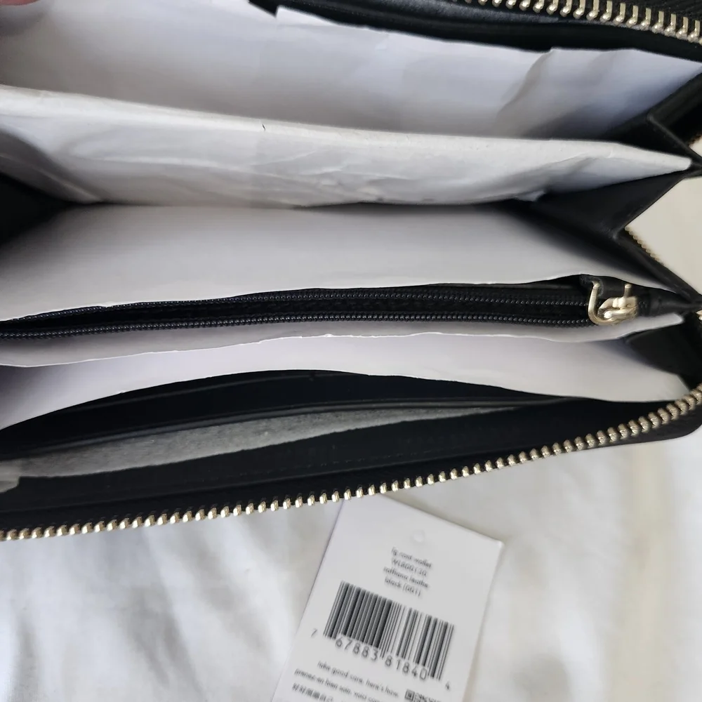 kate spade black zip-around saffiano wallet with gold logo